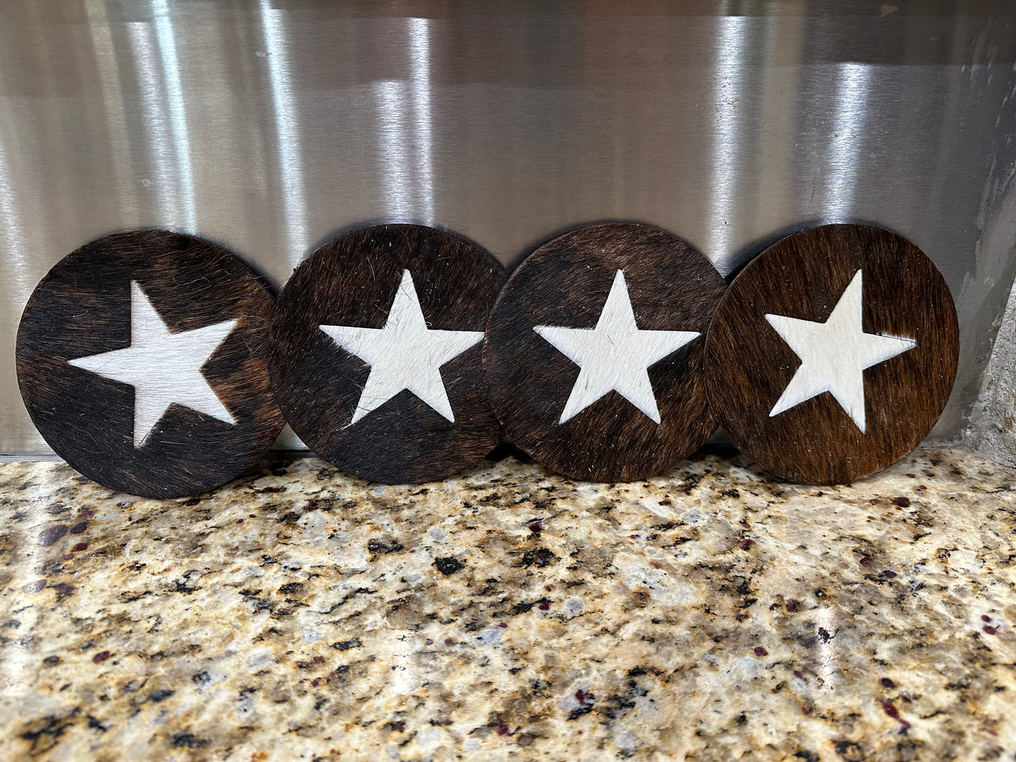 COWHIDE COASTERS